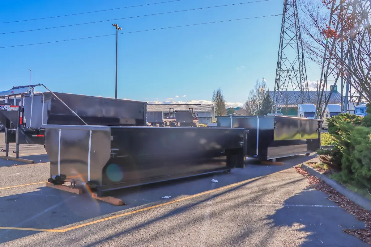 Roll-off dumpster ready for waste disposal at job site for 4 Yard Dumpster Rental in Carroll